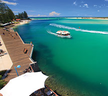 River boat on turquoise ocean at Caloundra, Sunshine Coast